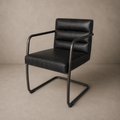 Silla de comedor Arthur en cuero negro vintage con estructura metálica